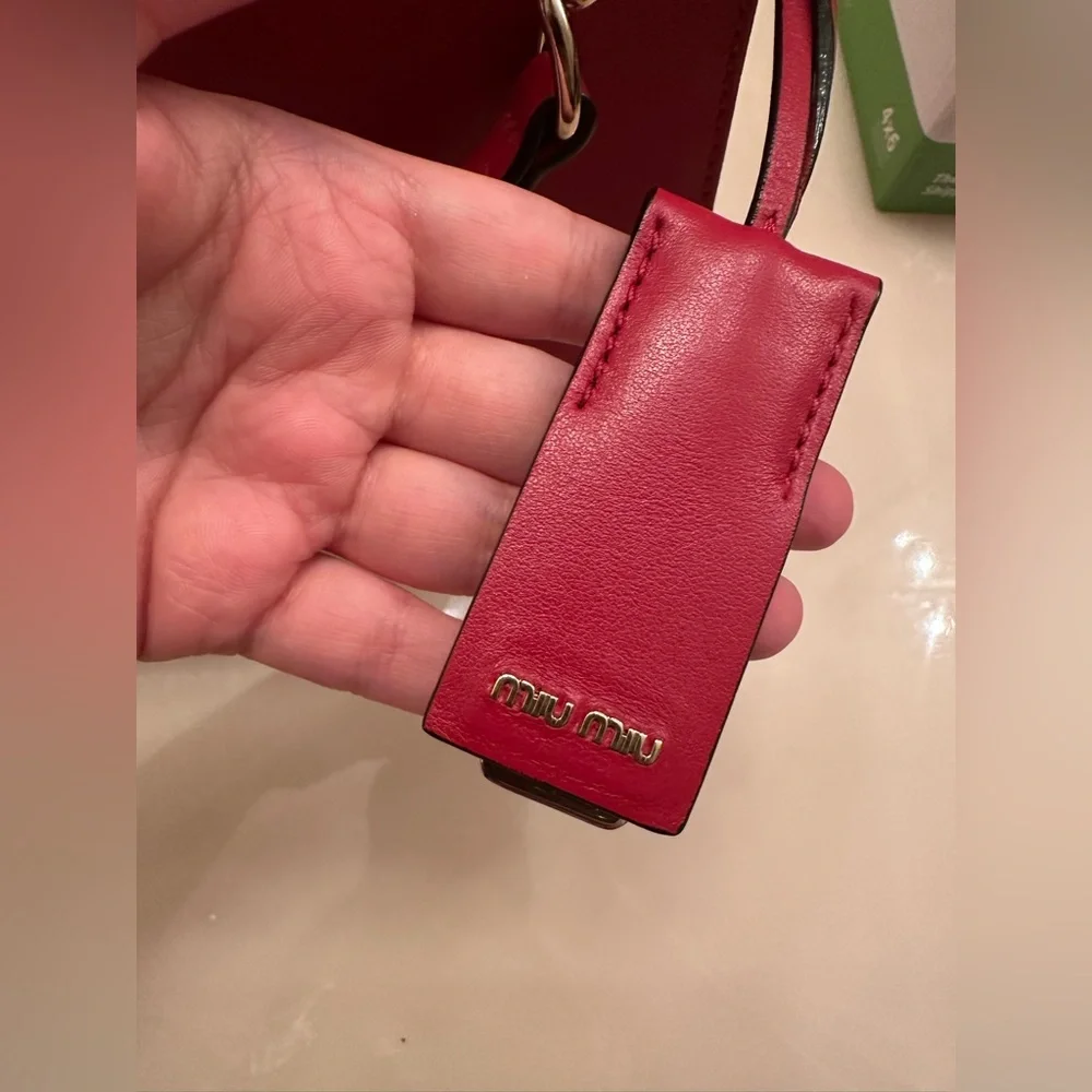 Very rare Miu Miu $2500 Authentic Red Leather Chain Handle Shoulder Bag.